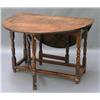 Image 1 : An 18th century walnut and oak oval gateleg table, W 105cms D 44.5cms...