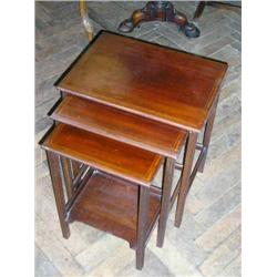 An Edwardian inlaid mahogany nest of three tea tables, W 45.5cms D 33cms (the largest)...