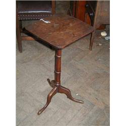 A 19th century oak and mahogany occasional table on pillar and tripod base, H 69.5cms W 35.5cms...