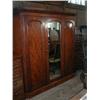 Image 1 : A Victorian mahogany wardrobe with mirrored door, H 122.5cms W 206cms...