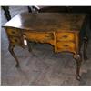 Image 1 : A Queen Anne style banded walnut serpentine dressing table on cabriole legs, H 79cms W 108cms...