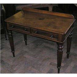 A Victorian mahogany side table on turned reeded legs, H 81cms W 99cms...
