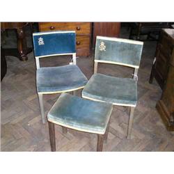 A George VI coronation chair; a similar stool; and an Elizabeth II coronation chair...