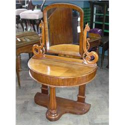 A Victorian mahogany demi-lune dressing table, H 148cms W 100cms...