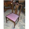 Image 1 : A set of four Chippendale style mahogany dining chairs having pierced vase splats...