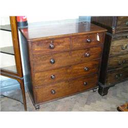 A Victorian mahogany chest of drawers on turned feet, H 105.5cms W 106cms...