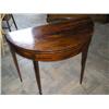 Image 1 : A George III mahogany demi-lune card table with folding top, W 94cms D 44cms...