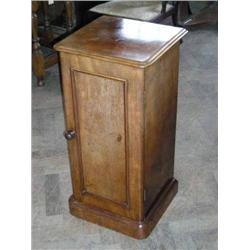 A Victorian mahogany pot cupboard enclosed by panelled door, H 78cms W 38.5cms...