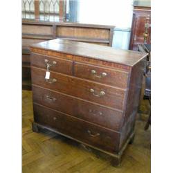 A George III mahogany cross-banded oak chest of drawers, H 106cms W 110.5cms...
