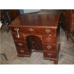 A George III mahogany kneehole desk, H 79cms W 79cms...