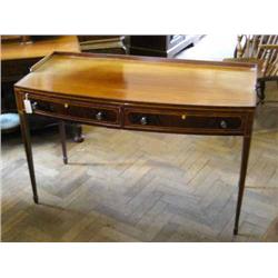 A mahogany bow-fronted side table, line-inlaid and cross-banded, W 122cms D 57.5cms...