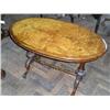 Image 1 : A Victorian burr walnut oval centre table, L 104cms D 60cms...