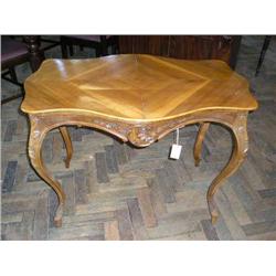 A Continental carved walnut centre table, W 98.5cms D 61cms...