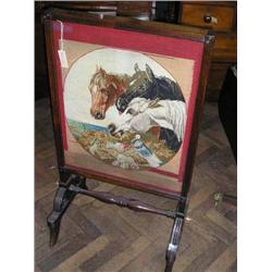 A William IV reeded and carved mahogany firescreen with tapestry panel after Herring, H 111cms W...