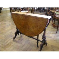 A Victorian burr-walnut oval sutherland table, L 104cms max W 90cms...