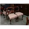 Image 1 : A set of four Victorian mahogany balloon back dining chairs....