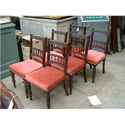 A set of six late Victorian mahogany dining chairs, on ring-turned tapered legs....