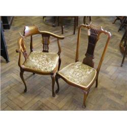 An Edwardian inlaid mahogany corner chair and a matching side chair....