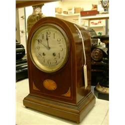 An Edwardian mahogany and boxwood mantel clock, having eight-day movement, H 32cms W 23cms...