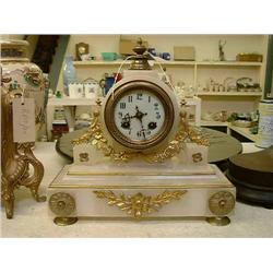A late 19th century alabaster Continental mantel timepiece having eight-day drum movement, H 28cm...