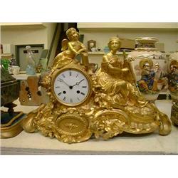A 19th century French ormolu figural mantel timepiece by Gentl & Edmonds, Paris, having eight-day...