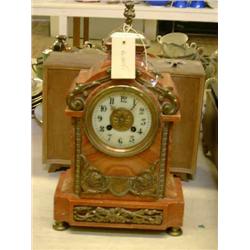 A 19th century French rouge marble mantel clock, H 39cms W 21.5cms...