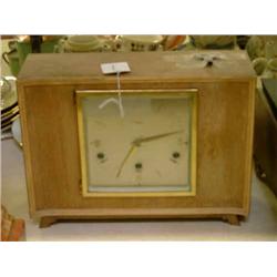 An Art Deco maple mantel clock retailed by Mappin & Webb, H 23cms W 30.5cms...