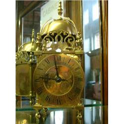 A 17th century style brass lantern timepiece, H 26cms...