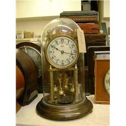 A German brass anniversary clock by Kundo, H 30cms, and five other clocks....