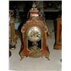 Image 1 : A 19th century French ormolu and boulle mantel timepiece, having eight-day movement, H 39cms...