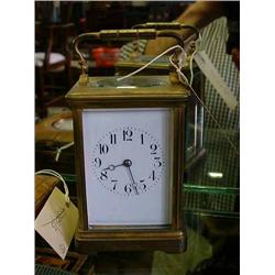 A French brass carriage timepiece, H 16cms...