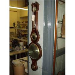A 19th century mahogany wheel barometer by Lambert, Dublin, H 3ft 2ins W 10ins...