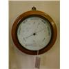 Image 1 : An Edwardian beech circular aneroid barometer, Dia 27cms...