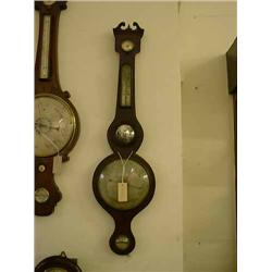 A 19th century mahogany wheel barometer by Mangiacavalli, 17 Leather Lane, H 95cms W 25.5cms...