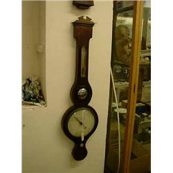 A Victorian rosewood wheel barometer, H 96.5cms W 25.5cms...