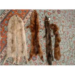 Four fur stoles...
