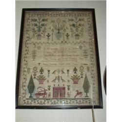 A sampler by Susan Sancroft aged 9, 1803. 41cms x 31cms...