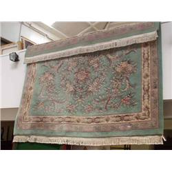 A Chinese turquoise ground floral-cut carpet, L 366cms W 274cms...