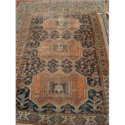A blue ground Turkish rug; and two other rugs L 202cms W 128cms (Turkish rug)...