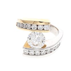 RING: Lady's 14ky&w round brilliant cut diamond crossover motif engagement ring; 1 (ctr) rb dia, app