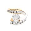 Image 1 : RING: Lady's 14ky&w round brilliant cut diamond crossover motif engagement ring; 1 (ctr) rb dia, app