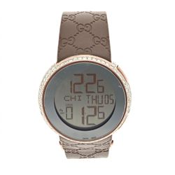 WATCH: [1] Gucci watch, digital movement, bronze tone case, 2 button on side, brown strap, serial #1