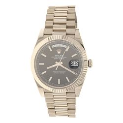WATCH: [1] Man's 18KWG Rolex Oyster Perpetual Day/Date, black dial stick markers, fluted bezel, watc