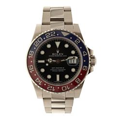 ROLEX: 18k white gold Rolex GMT Master II watch; 40mm case, black dial, bidirectional rotating blue 