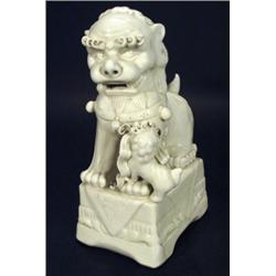 Chinese blanc-de-chine Dog of Foo on a rec…