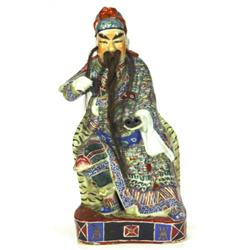 Chinese porcelain figure of a seated elder…