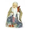 Image 1 : Chinese porcelain figure of an elder clutc…