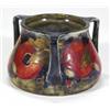Image 1 : Squat Moorcroft vase with three angular ha…