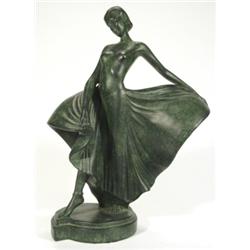 Green glazed plaster figurine of an Art De…