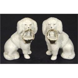 Pair of Continental porcelain poodles with…